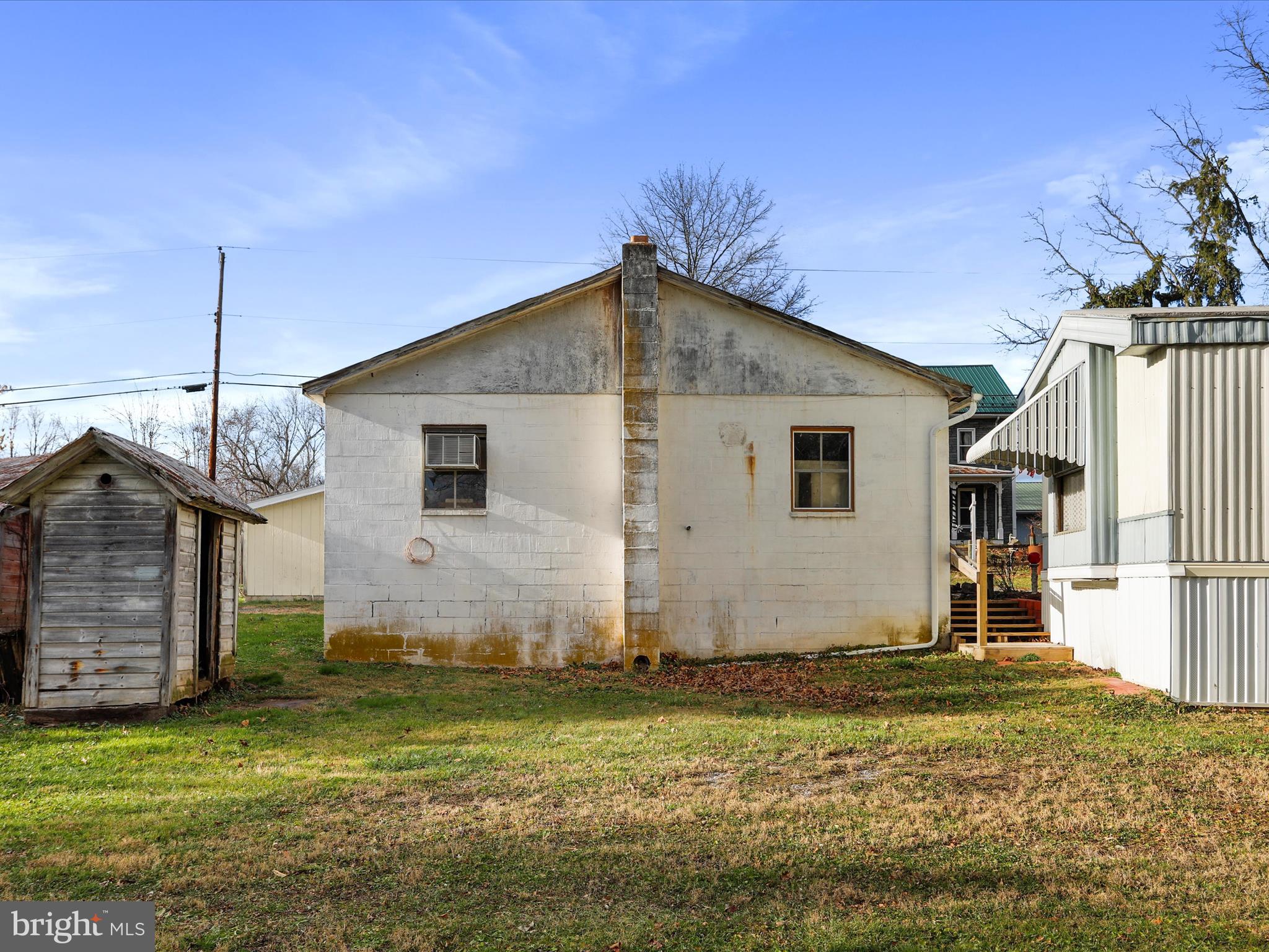 11713 Ernstville Road Big Pool, MD 21711 - Photo 23 of 47 a front view of a house with a yard
