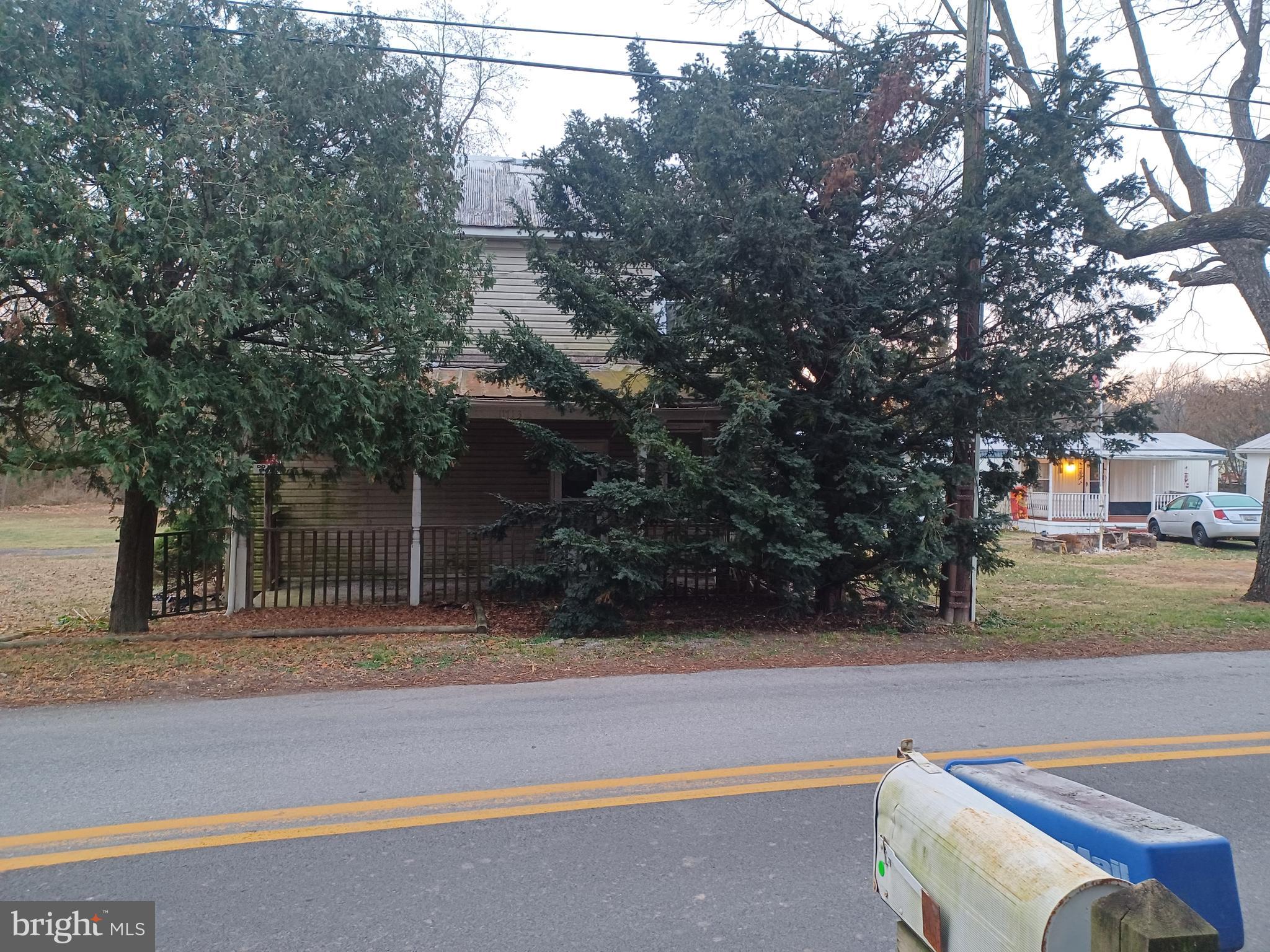 11713 Ernstville Road Big Pool, MD 21711 - Photo 31 of 47 a backyard of a house with lots of green space