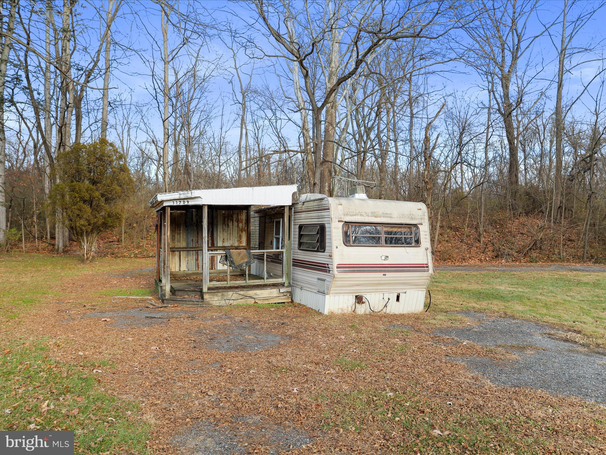 11713 Ernstville Road Big Pool, MD 21711 - Photo 37 of 47 a front view of a house with garden