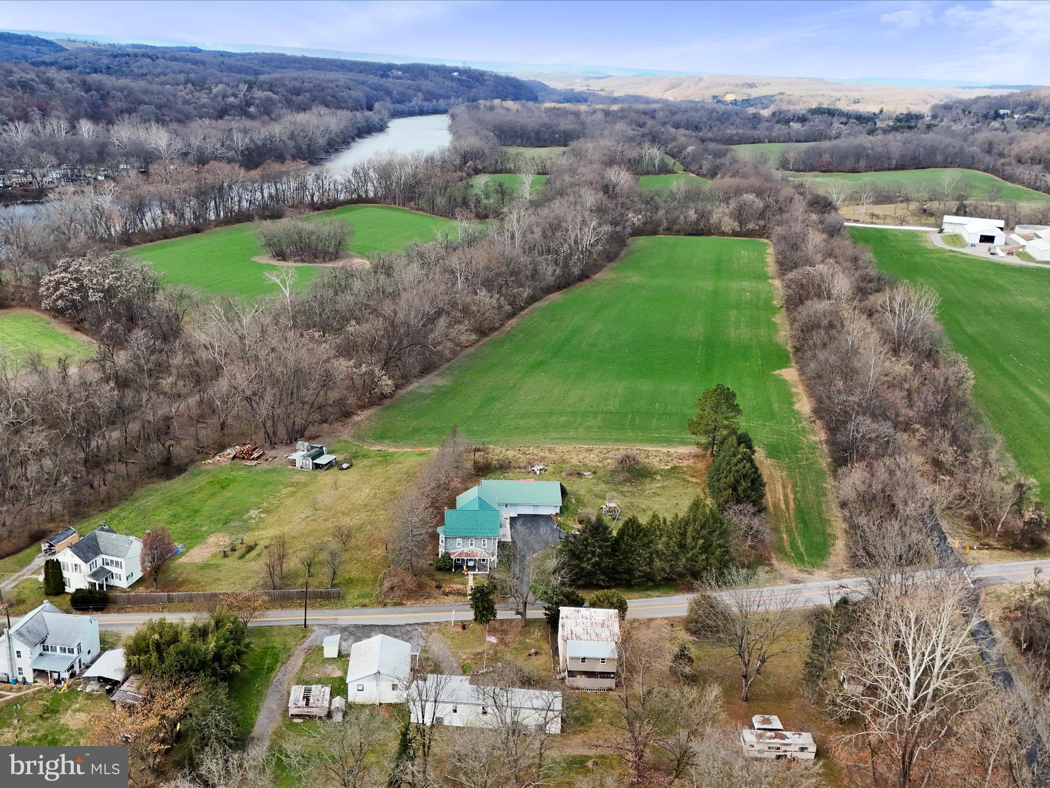11713 Ernstville Road Big Pool, MD 21711 - Photo 43 of 47 an aerial view of a house with a garden and lake view