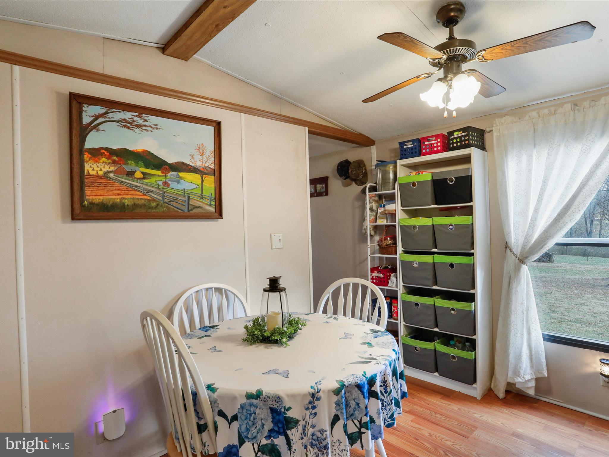 11713 Ernstville Road Big Pool, MD 21711 - Photo 8 of 47 a bedroom with furniture and a window