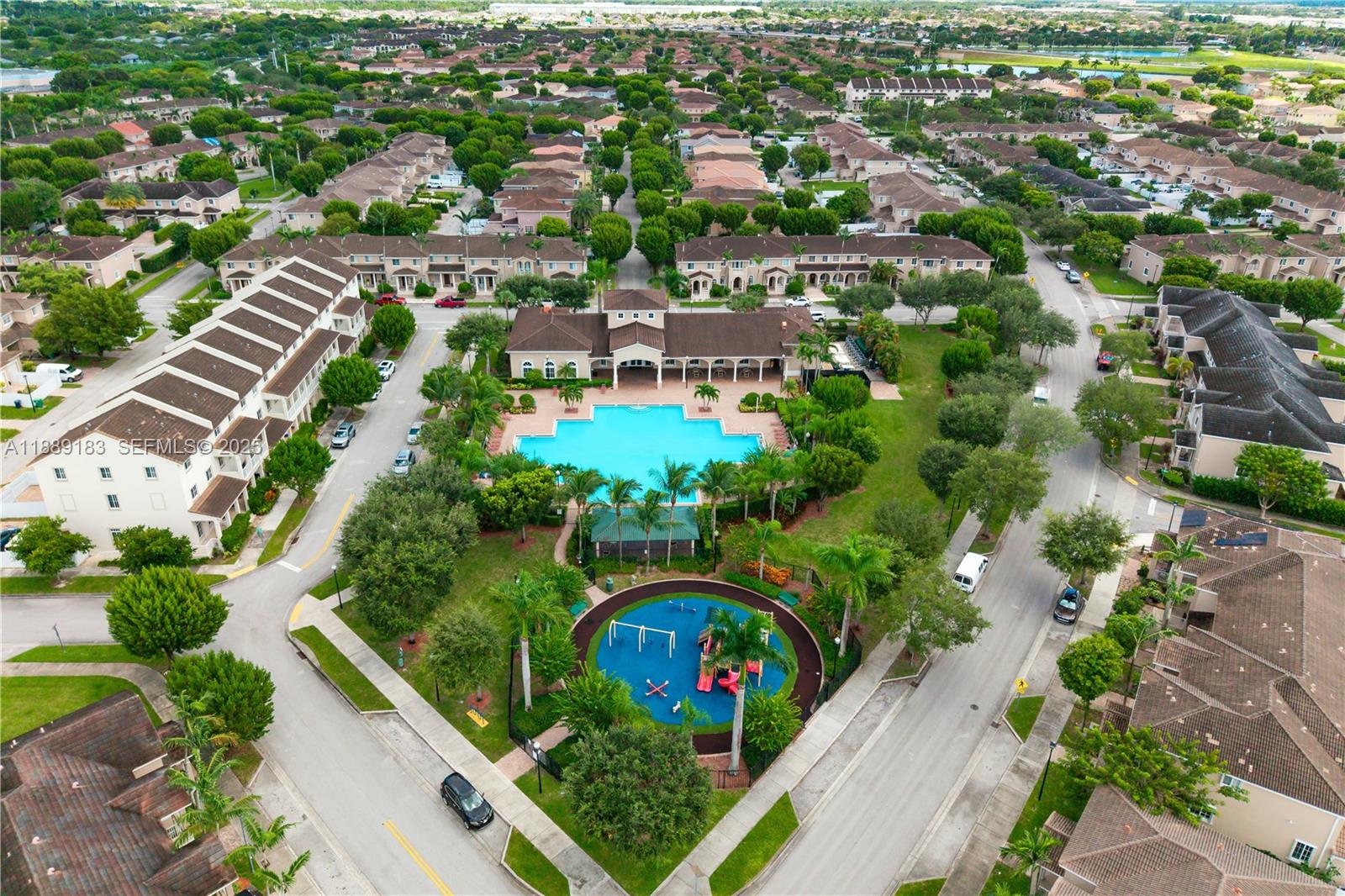 14254 Southwest 272nd Street Homestead, FL 33032 - Photo 24 of 25 an aerial view of multiple house