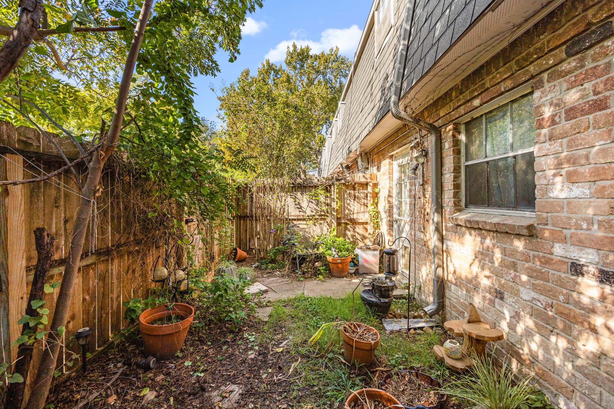 9023 Gaylord Drive, Unit 101 Houston, TX 77024 - Photo 16 of 23 a view of yard with patio