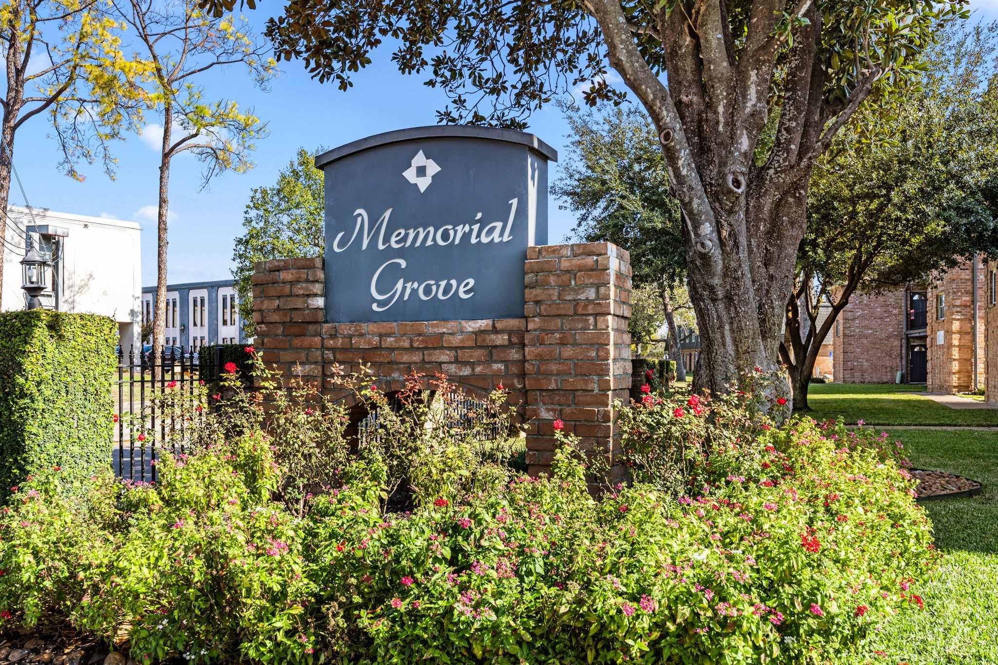 9023 Gaylord Drive, Unit 101 Houston, TX 77024 - Photo 2 of 23 a sign on the side of a building