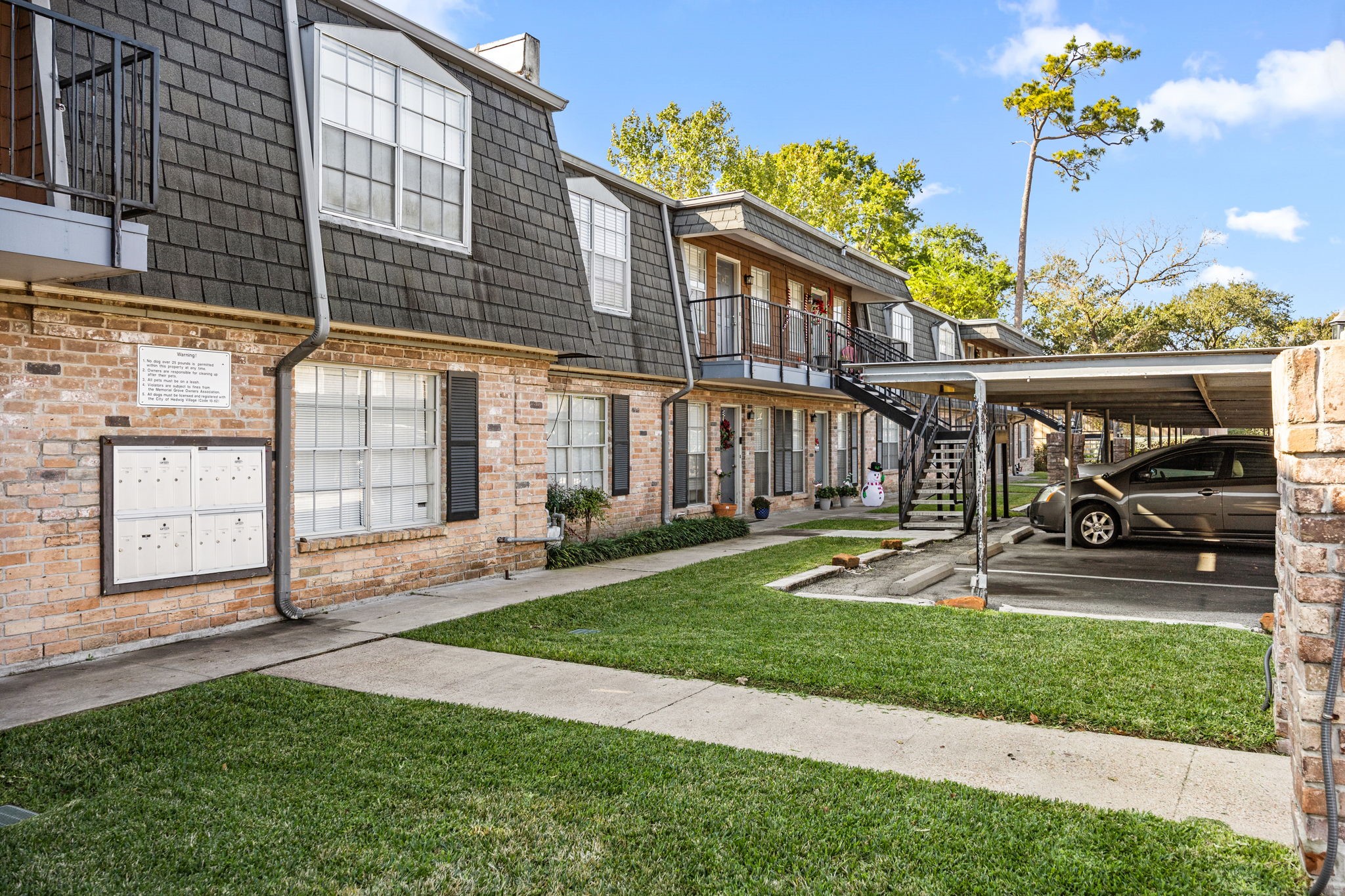 9023 Gaylord Drive, Unit 101 Houston, TX 77024 - Photo 22 of 23 a view of a backyard with a patio