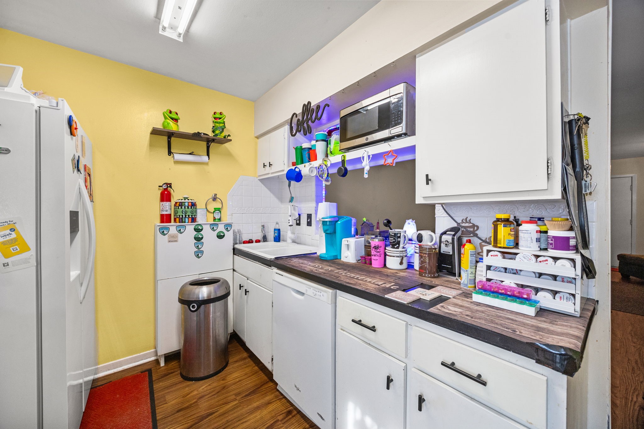9023 Gaylord Drive, Unit 101 Houston, TX 77024 - Photo 5 of 23 a utility room with sink dryer and washer