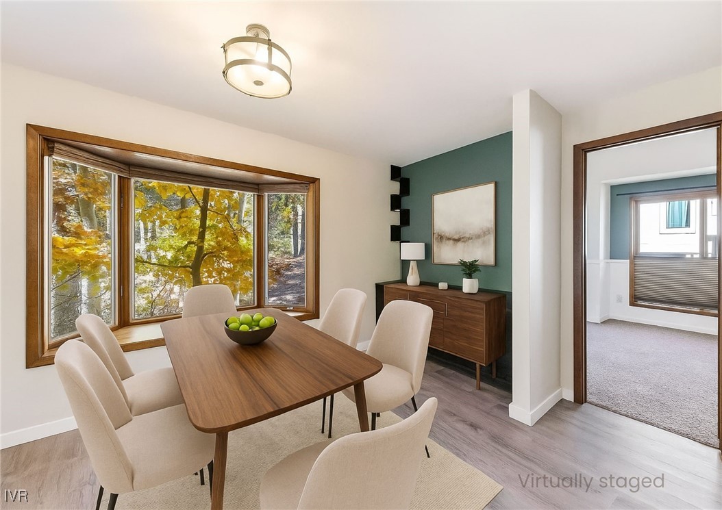 908 Harold Drive, Unit 23 Incline Village, NV 89451 - Photo 11 of 44 a view of a dining room with furniture window and outside view