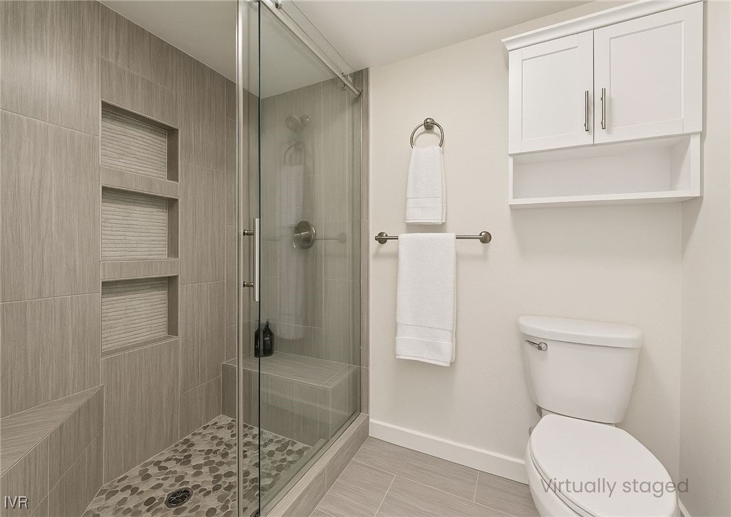 908 Harold Drive, Unit 23 Incline Village, NV 89451 - Photo 16 of 44 a bathroom with a toilet and a shower