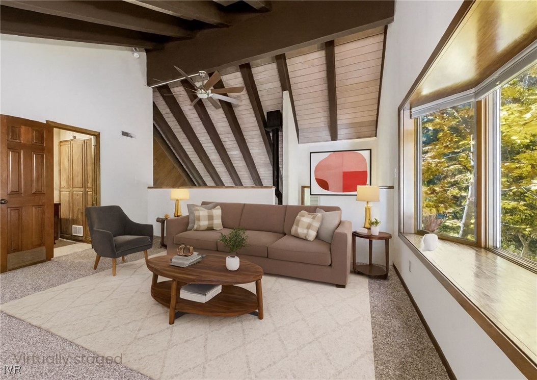 908 Harold Drive, Unit 23 Incline Village, NV 89451 - Photo 19 of 44 a living room with furniture and a large window