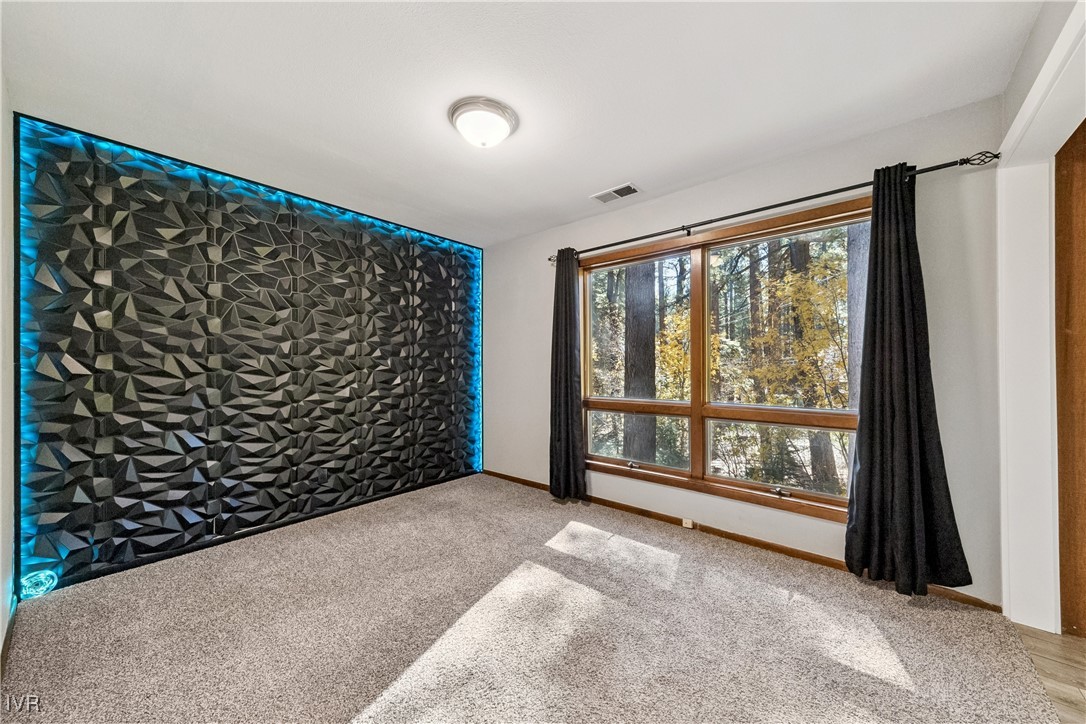 908 Harold Drive, Unit 23 Incline Village, NV 89451 - Photo 26 of 44 a view of a big room with wooden floor and windows