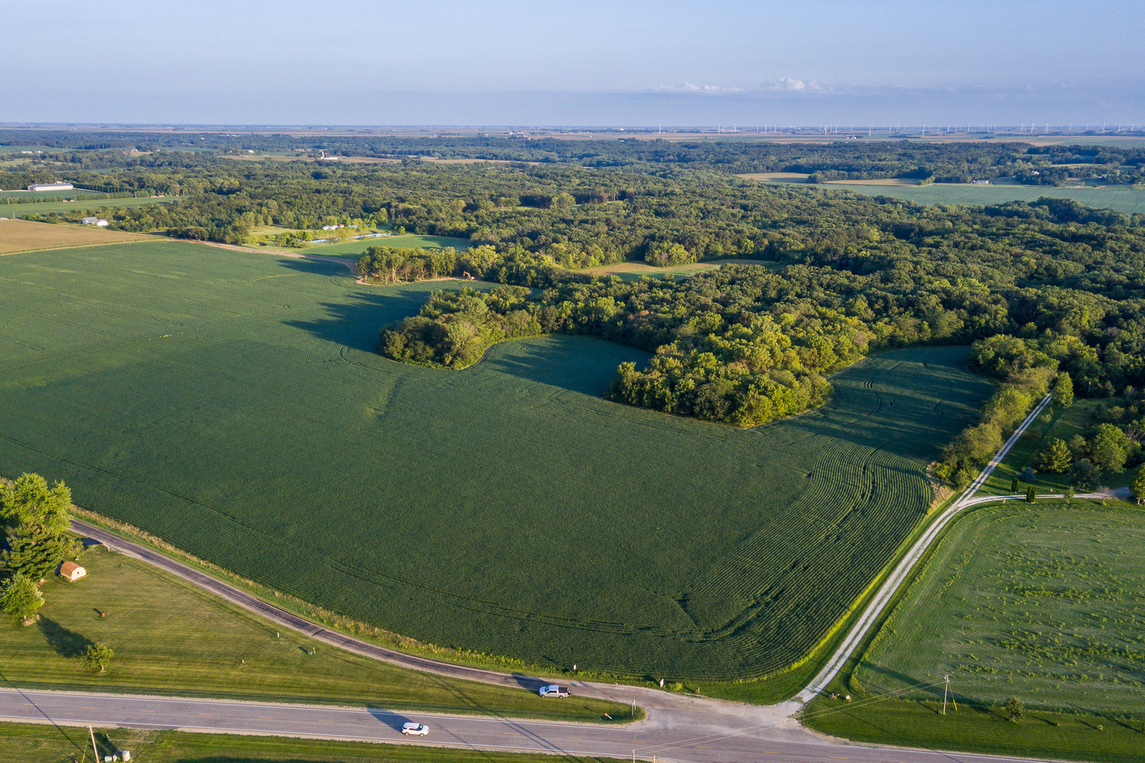 6080 Stagecoach Road Clinton, IL 61727 - Photo 6 of 8 a view of a lake with a mountain
