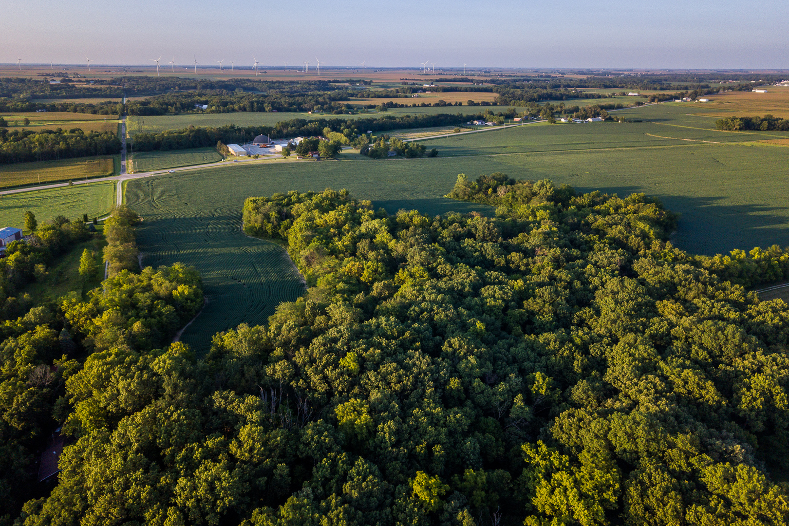 6080 Stagecoach Road Clinton, IL 61727 - Photo 7 of 8 a view of a lake with a city