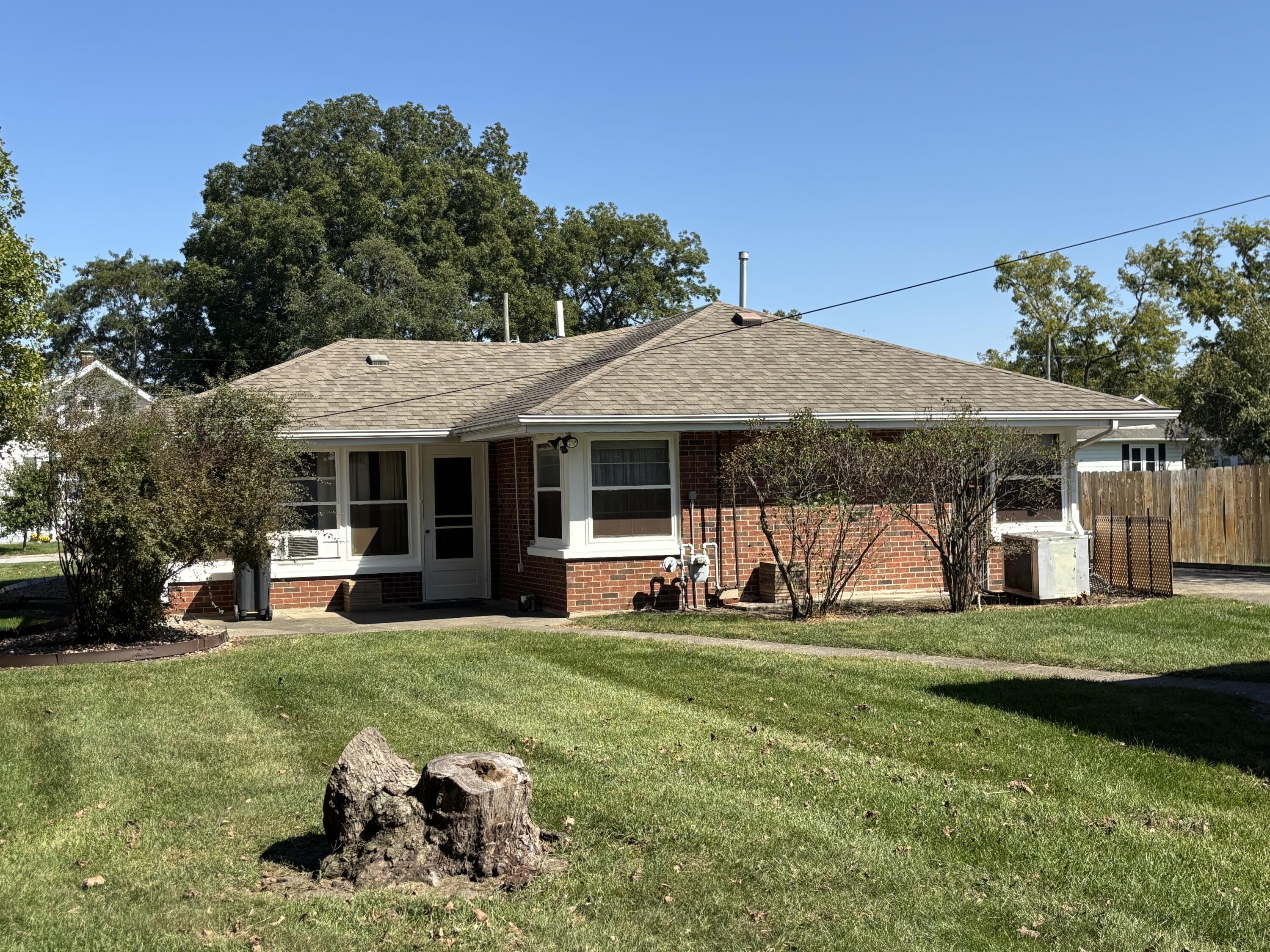 402 South Home Avenue Rensselaer, IN 47978 - Photo 23 of 27 a view of a house with a yard and sitting area