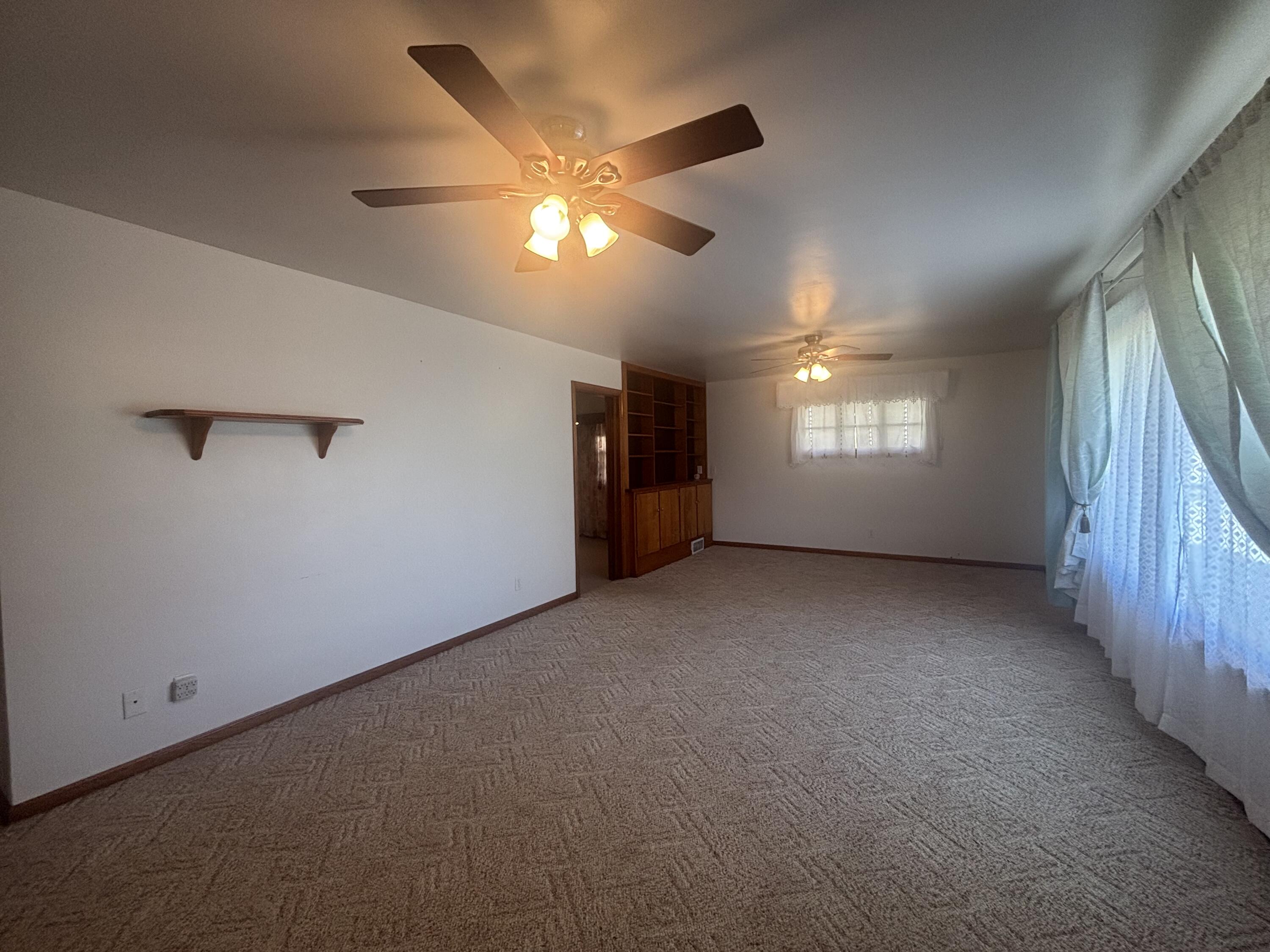 402 South Home Avenue Rensselaer, IN 47978 - Photo 6 of 27 a view of an empty room with a window