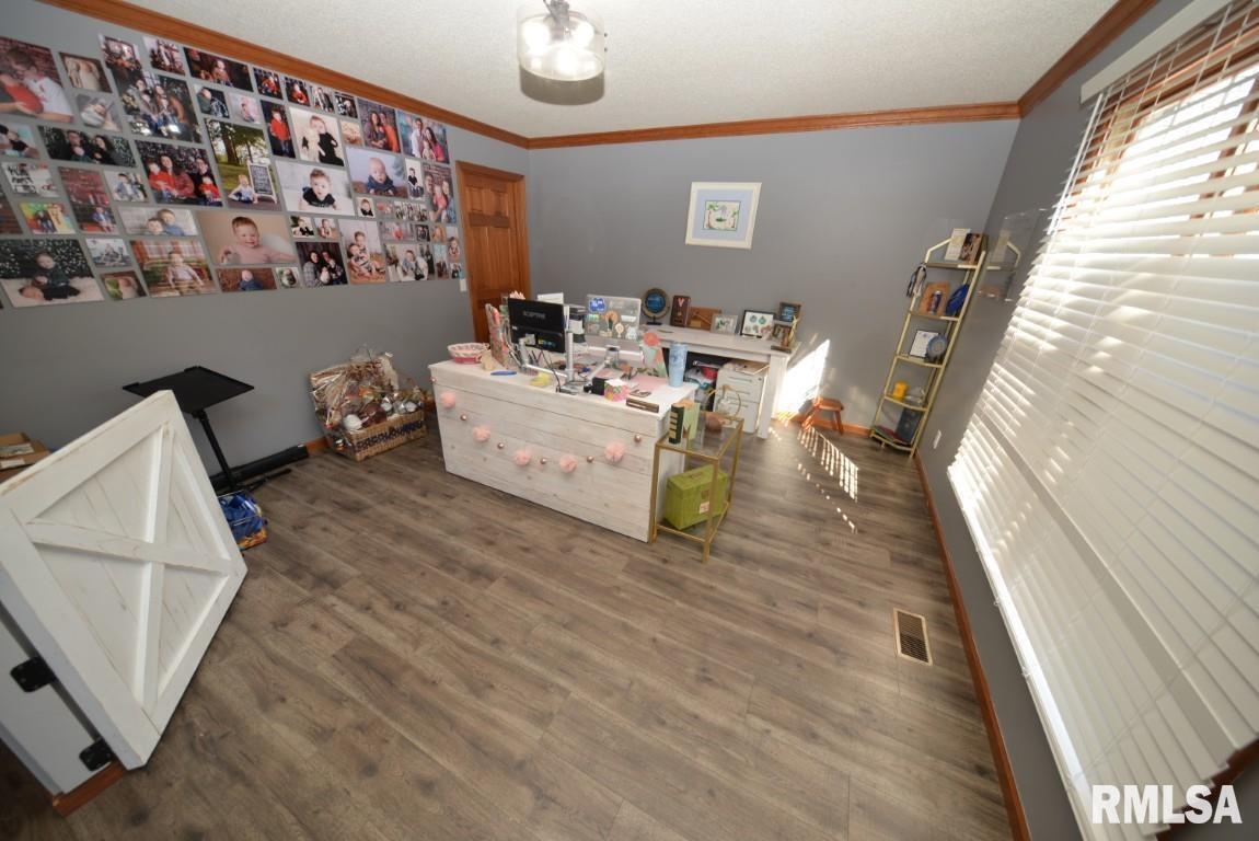 501 Cardinal Drive Mount Vernon, IL 62864 - Photo 18 of 57 a living room with furniture and a large window