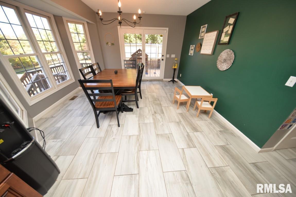 501 Cardinal Drive Mount Vernon, IL 62864 - Photo 30 of 57 a living room with furniture and wooden floor