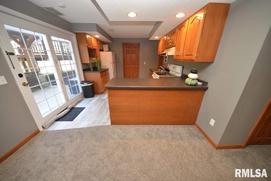 501 Cardinal Drive Mount Vernon, IL 62864 - Photo 39 of 57 a view of a kitchen with a sink and a window
