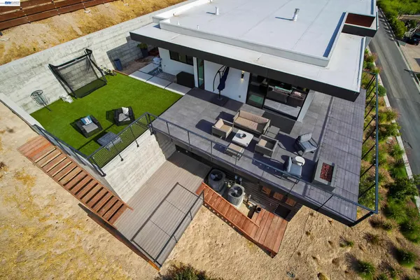 a view of living room filled with furniture and rug