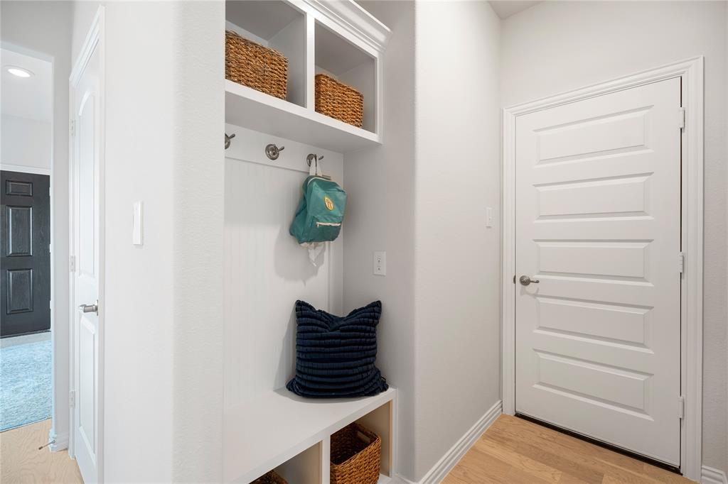8716 Saratoga Street Pilot Point, TX 76258 - Photo 15 of 16 a room that has a bed and a window in it