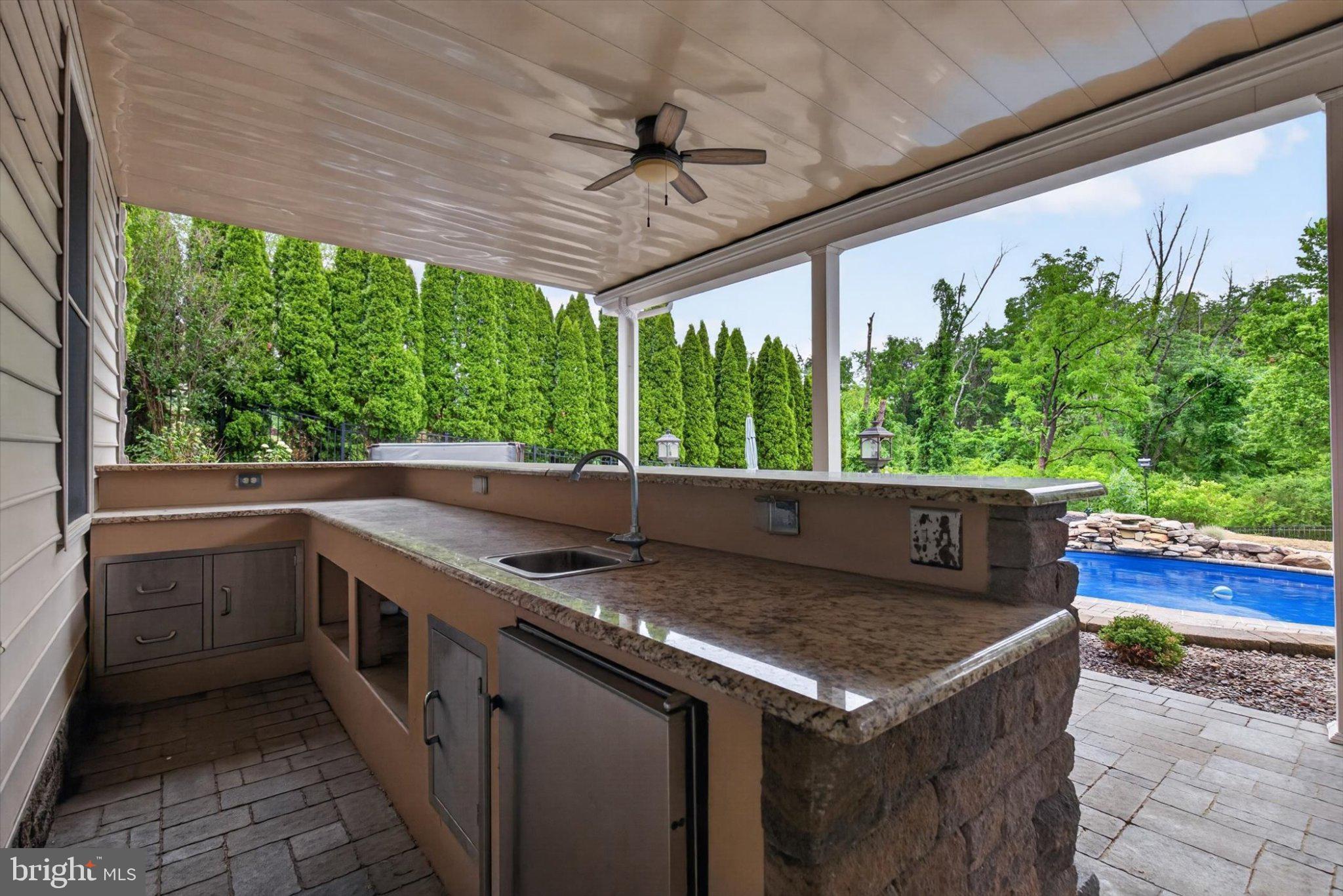 6505 Plowman Ridge Harrisburg, PA 17112 - Photo 64 of 83 Outdoor kitchen with serene views.