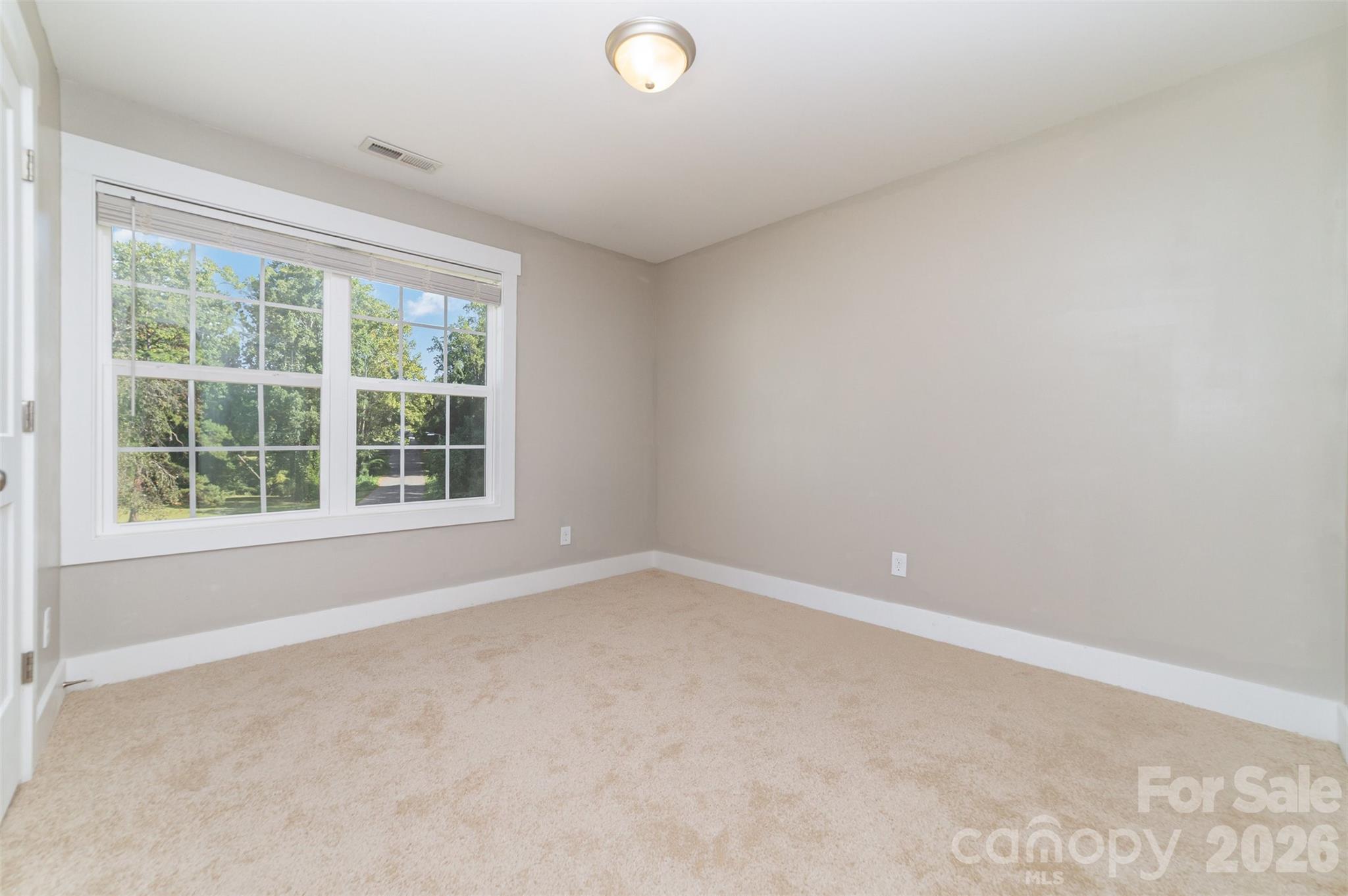 1003 Hunter Valley Road Shelby, NC 28150 - Photo 17 of 23 an empty room with a window