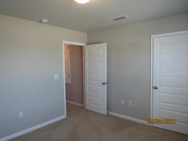 an empty room with closet