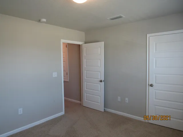 an empty room with closet