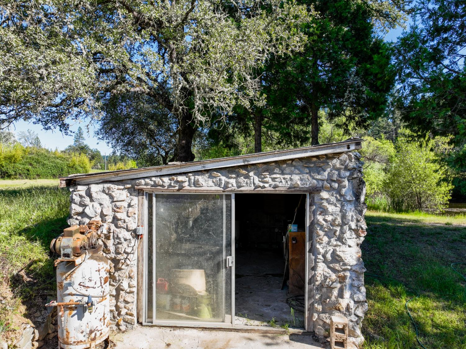 13351 Newtown Road Nevada City, CA 95959 - Photo 25 of 50 a view of a wooden door and garden