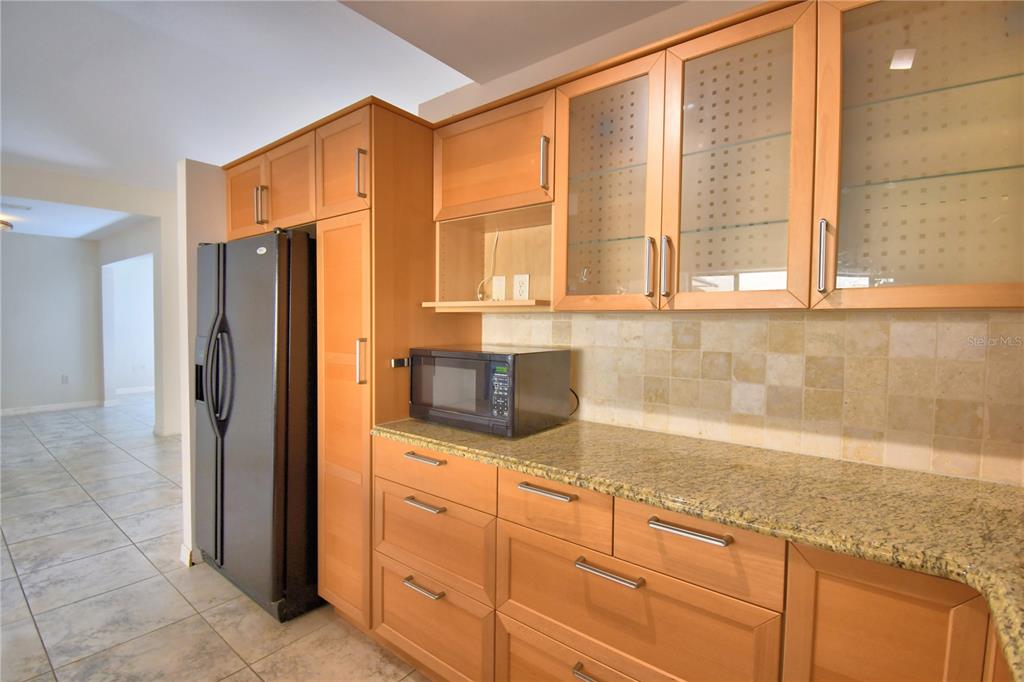 263 Mariposa Winter Haven, FL 33884 - Photo 22 of 69 a bathroom with a granite countertop sink and a large mirror