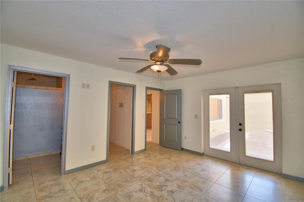 263 Mariposa Winter Haven, FL 33884 - Photo 31 of 69 a view of an empty room with a ceiling fan