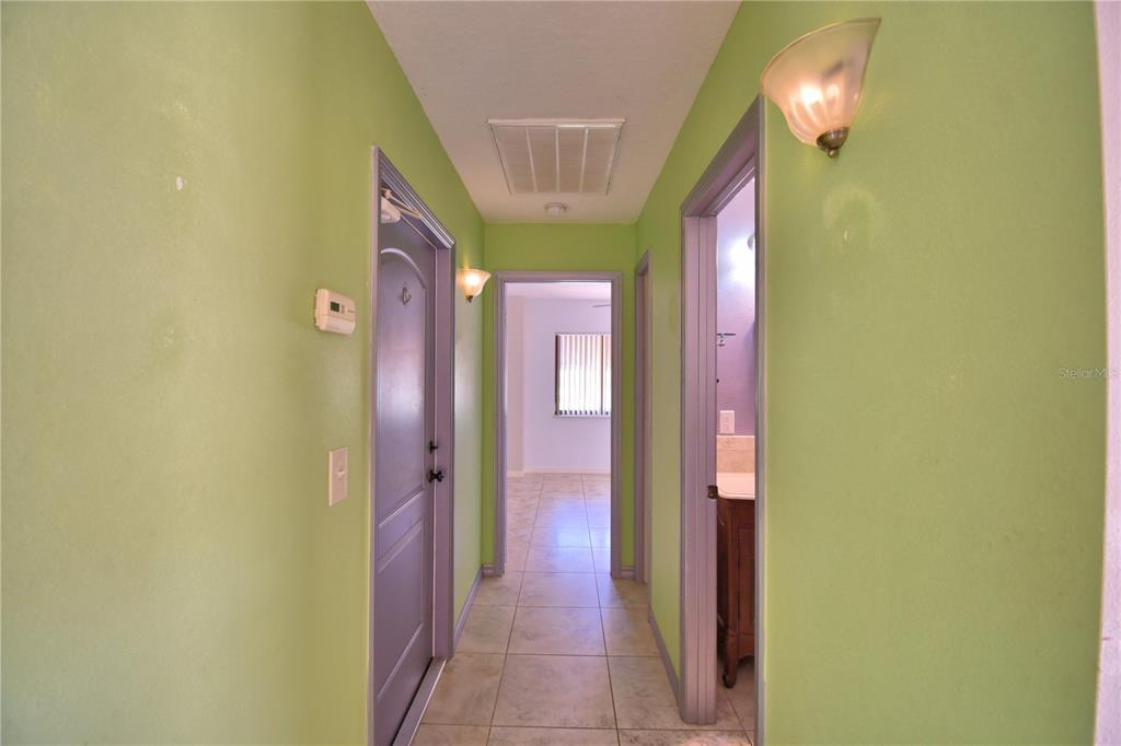 263 Mariposa Winter Haven, FL 33884 - Photo 43 of 69 a view of a hallway with furniture