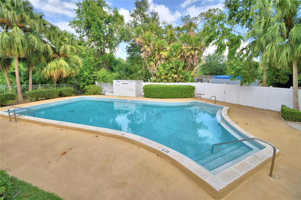 263 Mariposa Winter Haven, FL 33884 - Photo 69 of 69 a view of a swimming pool with a chair