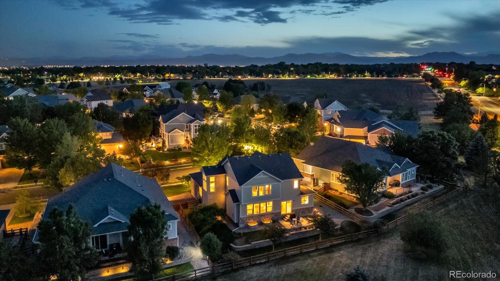 4786 Rabbit Mountain Road Broomfield, CO 80020 - Photo 35 of 41 an aerial view of residential houses with outdoor space
