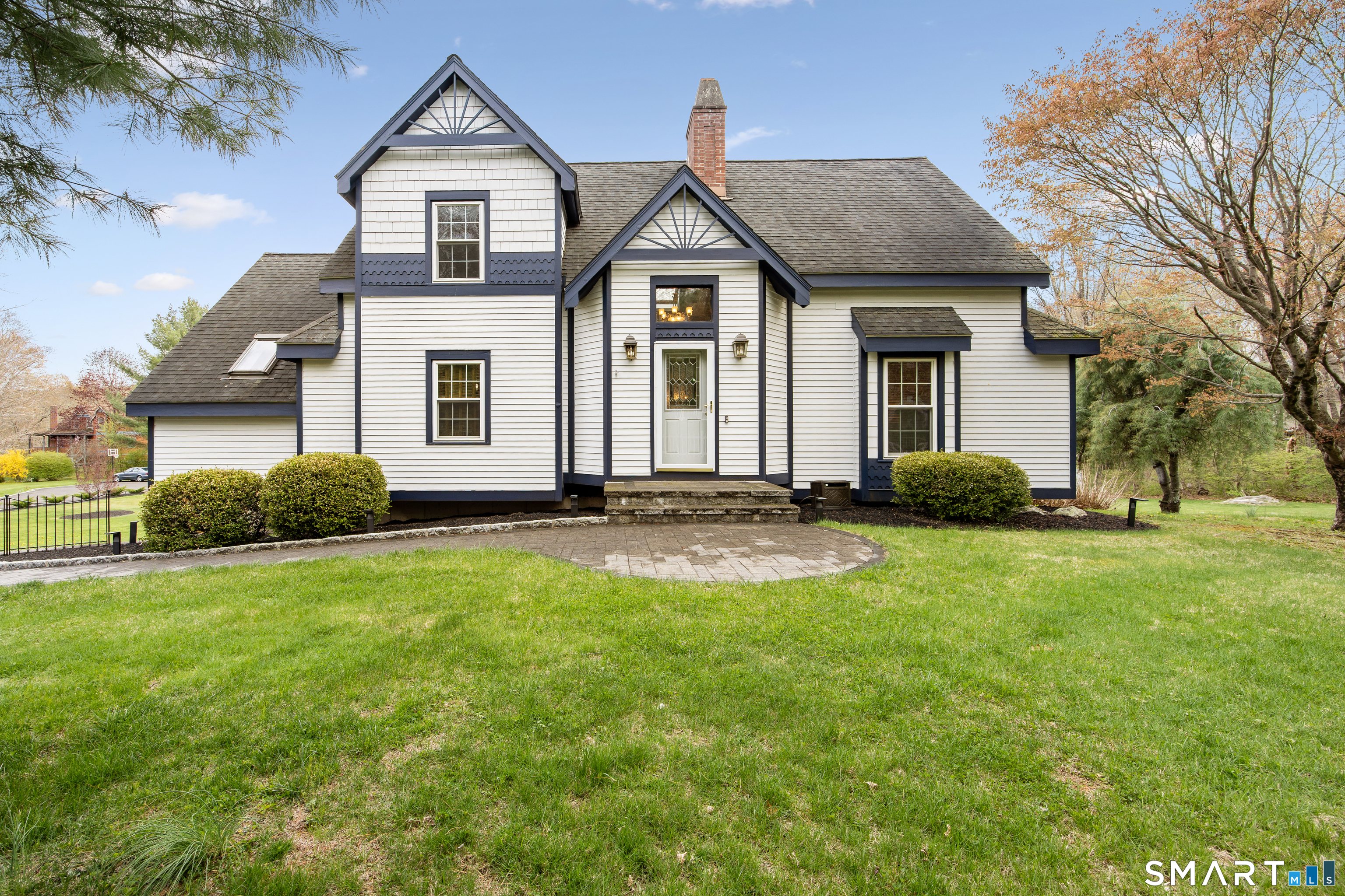 a front view of a house with a yard