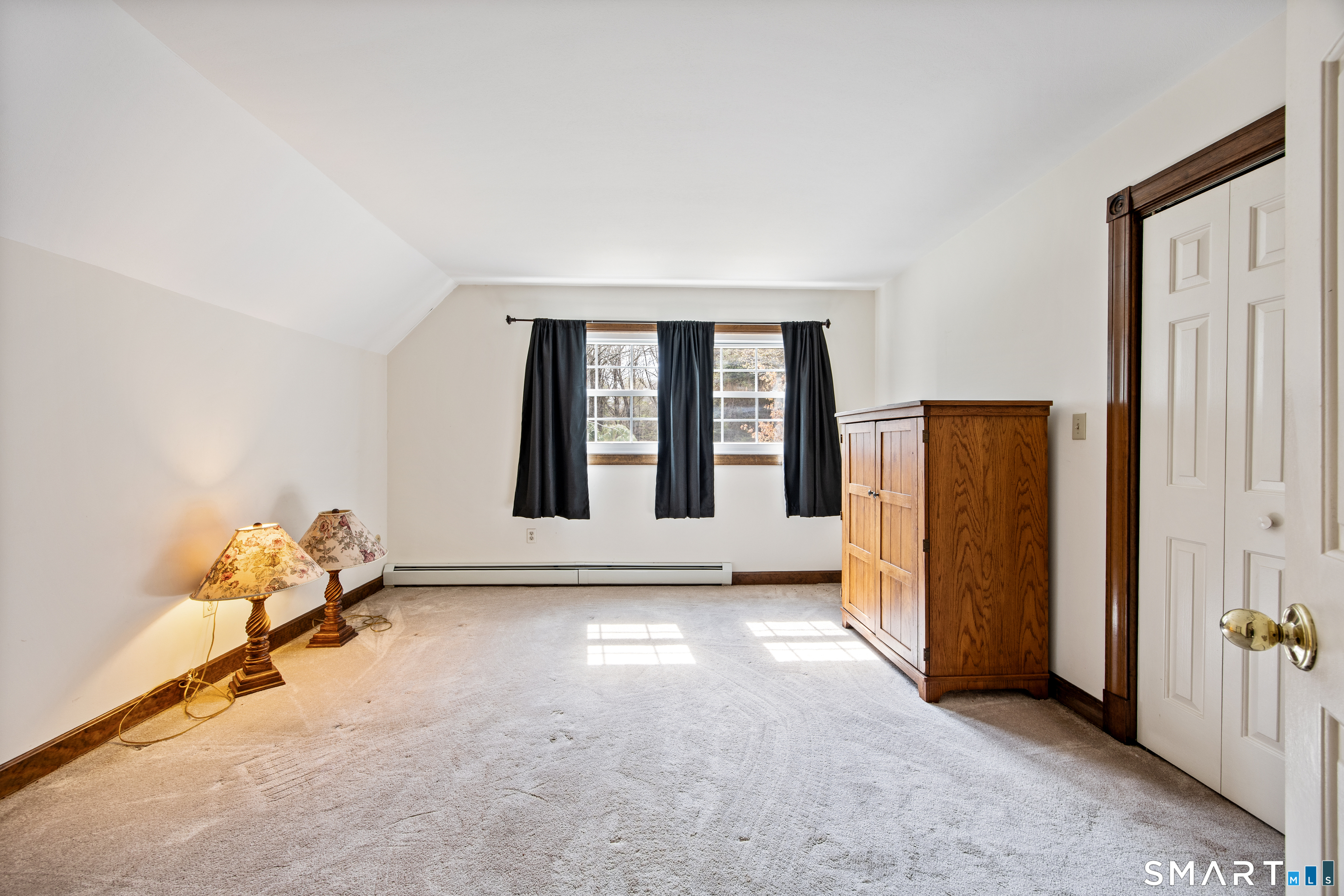 105 Quaker Farms Road Southbury, CT 06488 - Photo 26 of 40 an empty room with windows