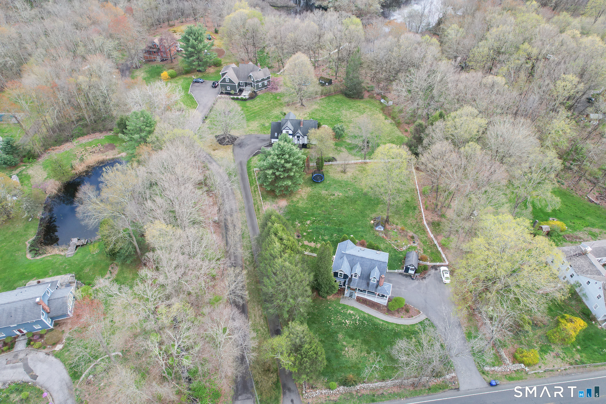 105 Quaker Farms Road Southbury, CT 06488 - Photo 37 of 40 an aerial view of a house with a yard