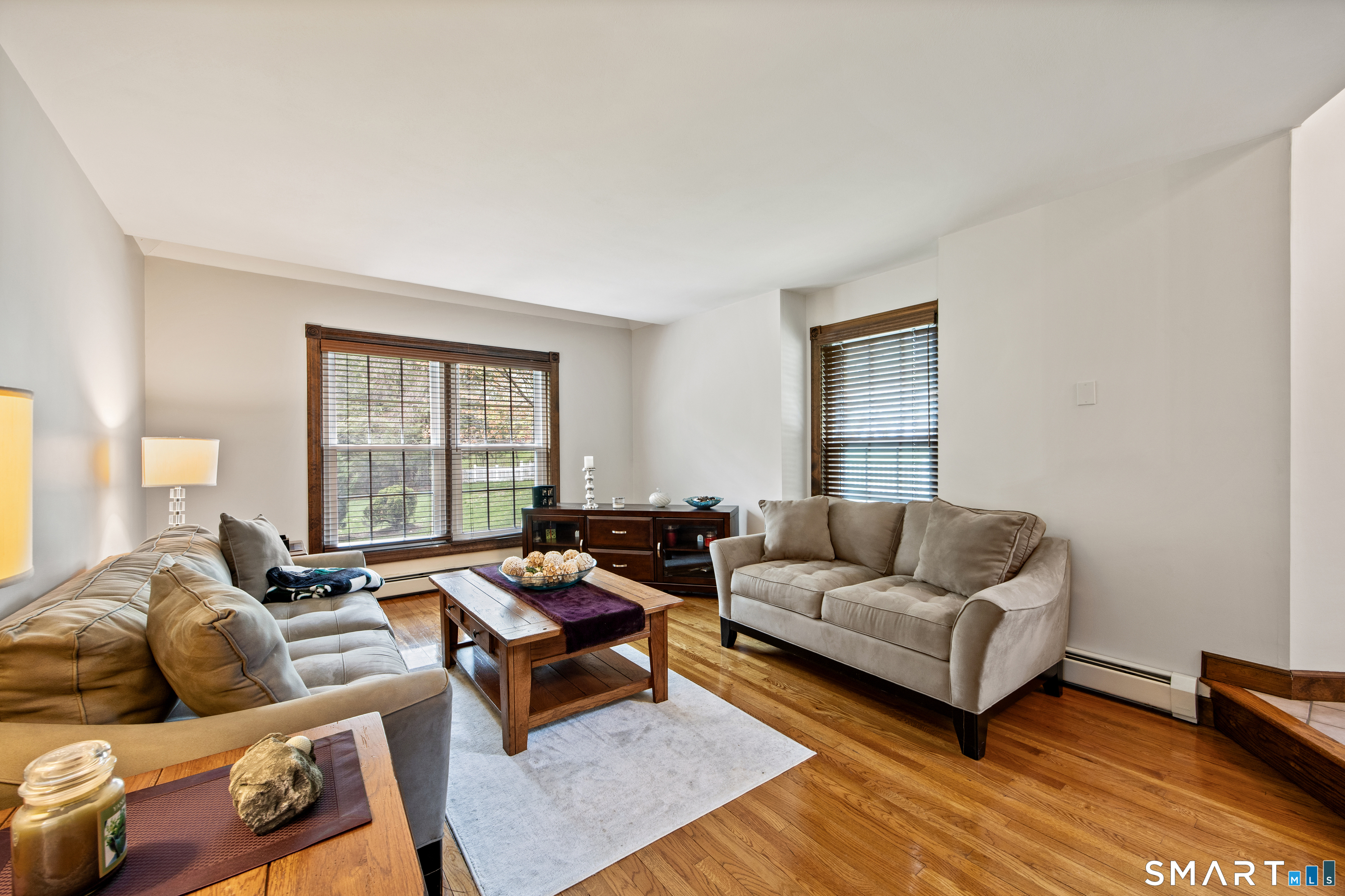 105 Quaker Farms Road Southbury, CT 06488 - Photo 8 of 40 a living room with furniture and a window