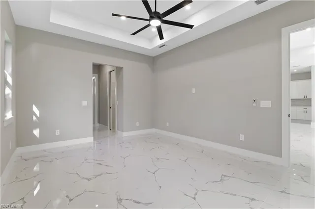 a view of an empty room and window