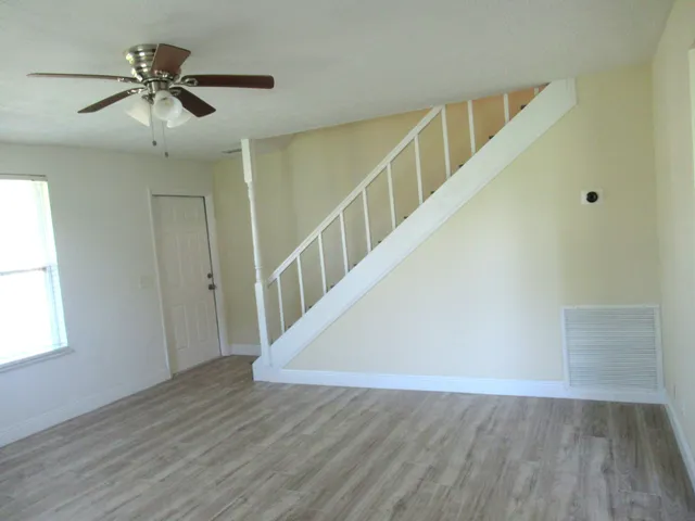 a view of a kitchen from the hallway