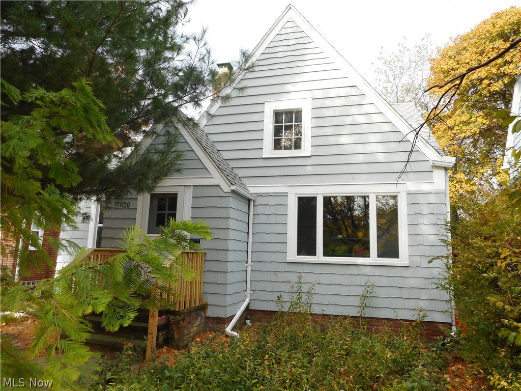Welcome to 1150 Castleton Road, Cleveland Heights, OH! This yard is full of perennial flowering plants and trees to enjoy! 
