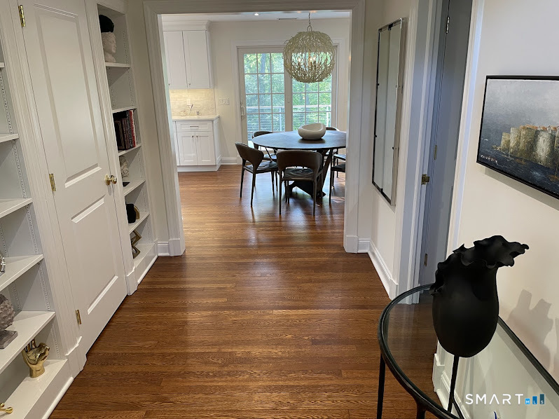 9 Tory Hole Road Darien, CT 06820 - Photo 6 of 33 a view of a dining room with furniture window and wooden floor