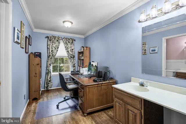 a room with gym equipment and a large window