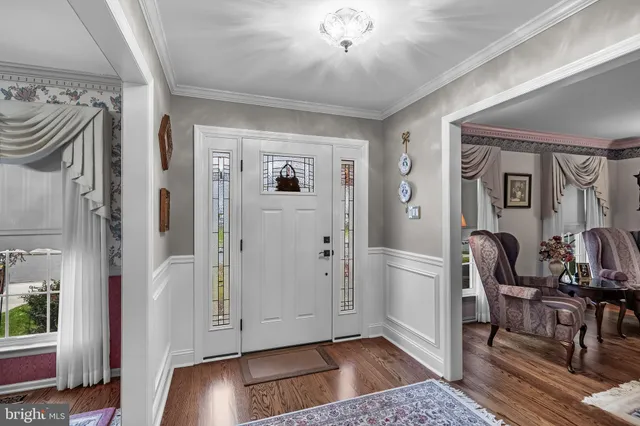 a view of livingroom with furniture and wooden floor