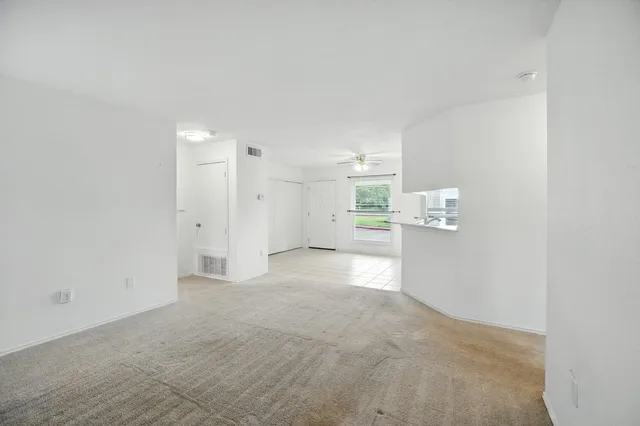 a view of a kitchen with a sink