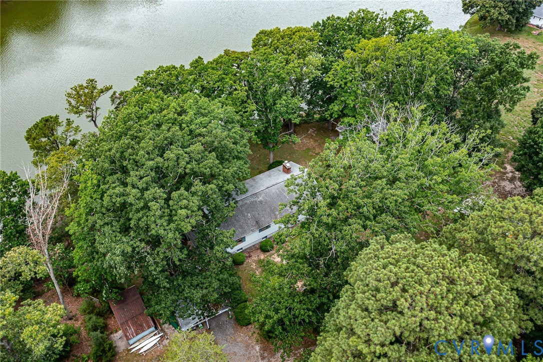 142 Bridge Lane Reedville, VA 22539 - Photo 30 of 56 an aerial view of residential house with outdoor space and trees all around