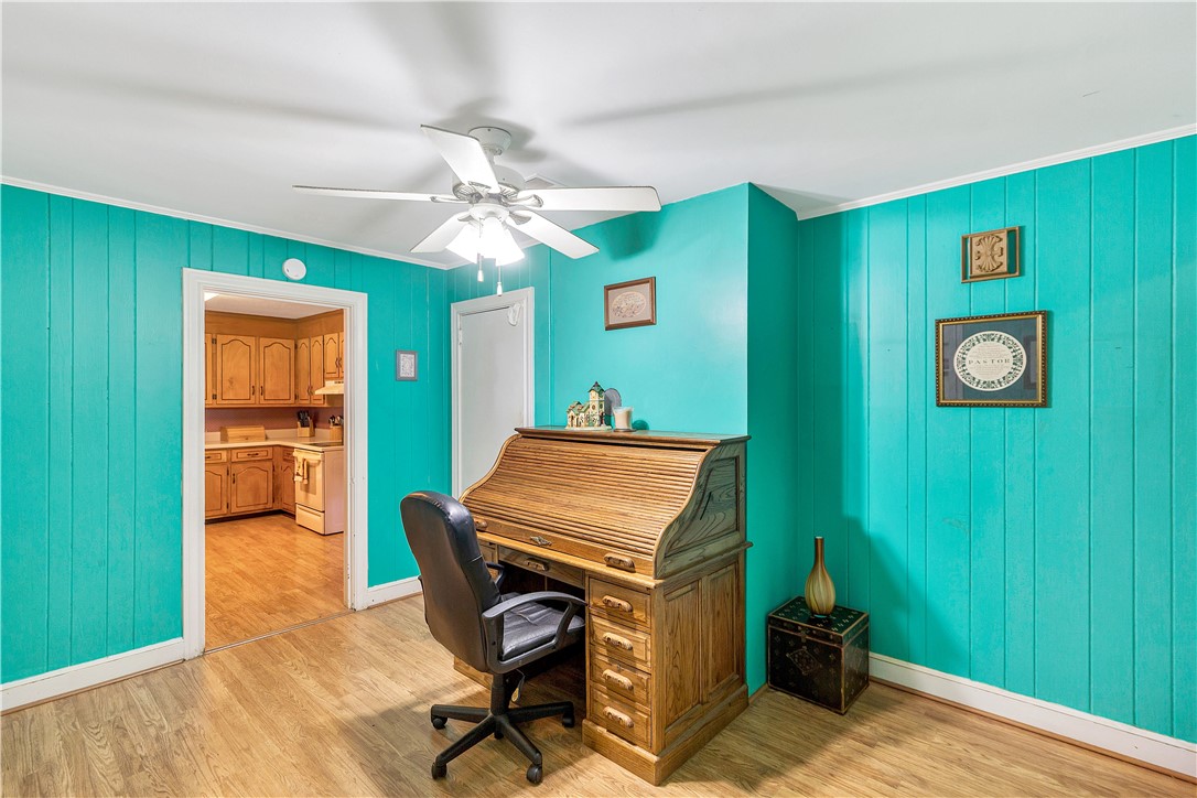 219 Beaty Square Anderson, SC 29624 - Photo 14 of 32 This versatile room features warm flooring and a ceiling fan, offering comfortable living.
