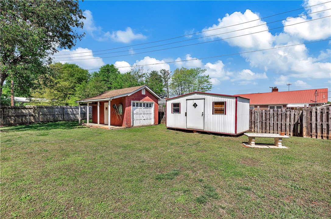 219 Beaty Square Anderson, SC 29624 - Photo 22 of 32 This spacious yard offers ample outdoor storage with two versatile outbuildings.