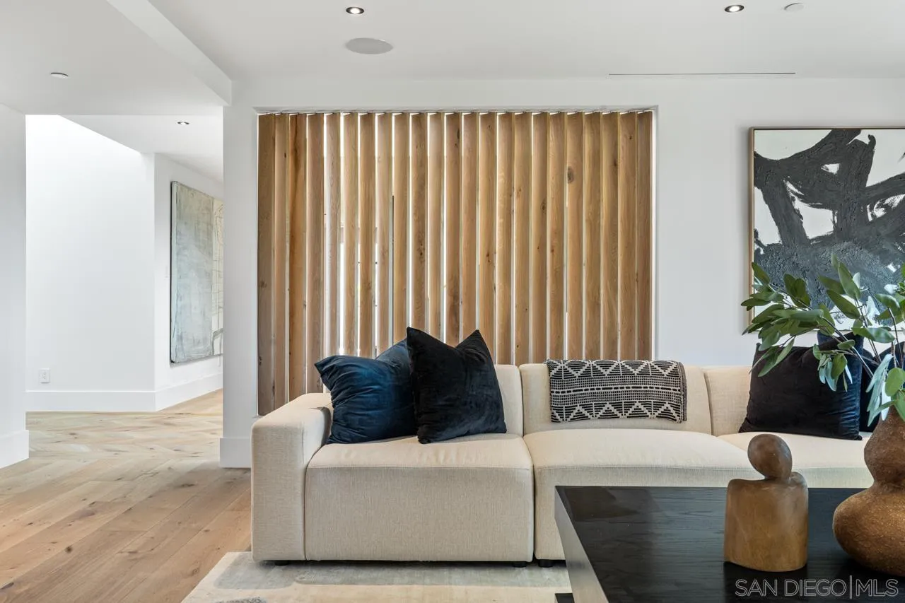 8433 Prestwick Drive La Jolla, CA 92037 - Photo 11 of 74 a living room with furniture and a potted plant