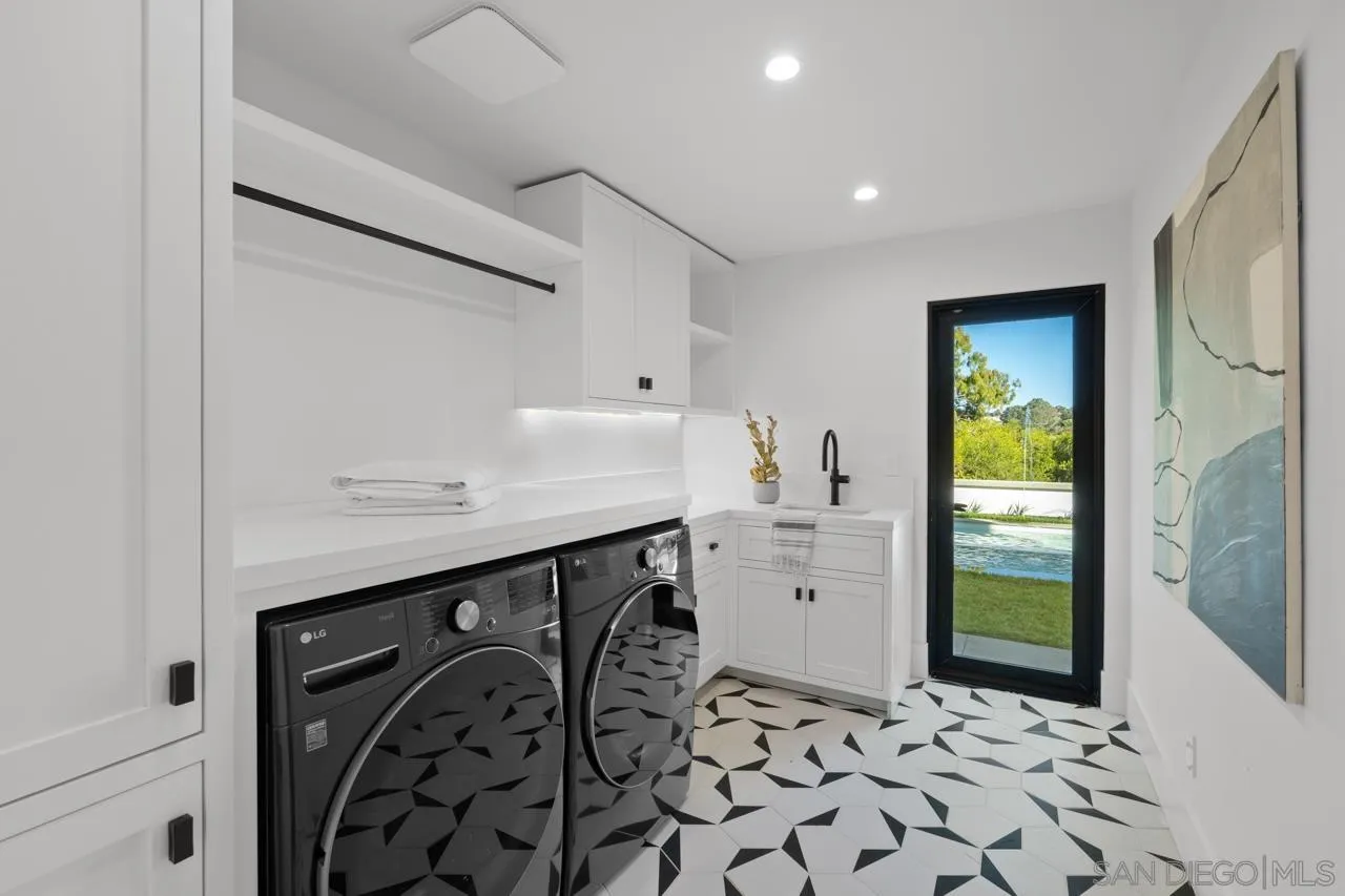 8433 Prestwick Drive La Jolla, CA 92037 - Photo 14 of 74 a view of a storage & utility room with a sink
