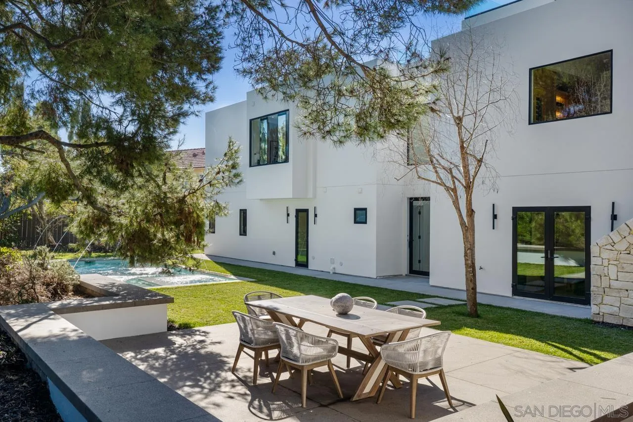 8433 Prestwick Drive La Jolla, CA 92037 - Photo 24 of 74 a view of a swimming pool with chairs